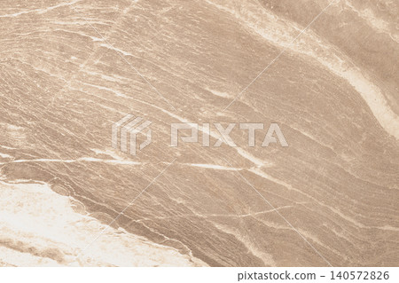 High angle full frame background of a warm beige and brown stone tile texture, featuring organic wavy patterns and veins for a rustic or elegant studio backdrop High angle full frame background of a warm beige and brown stone tile texture, featuring organic wavy patterns and veins for a rustic or elegant studio backdrop 140572826