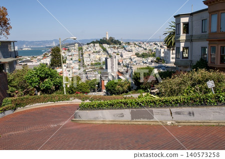 San Francisco city skyline from Lombard Street brick road San Francisco city skyline from Lombard Street brick road 140573258