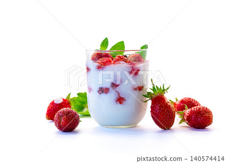 Fresh organic strawberries with yogurt and basil garnish Fresh organic strawberries with yogurt and basil garnish 140574414