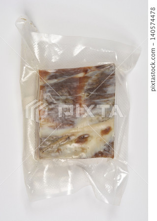 Vacuum Packed Smoked Pork Belly Bacon on White Background Vacuum Packed Smoked Pork Belly Bacon on White Background 140574478
