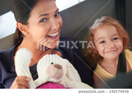 Taxi, portrait or mother and daughter in a car for adventure, road trip or bonding with teddy bear games. Love, family and kid with mom in a backseat of cab with care, trust and safety, travel or fun Taxi, portrait or mother and daughter in a car for adventure, road trip or bonding with teddy bear games. Love, family and kid with mom in a backseat of cab with care, trust and safety, travel or fun 140574936
