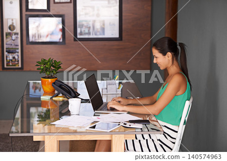 Woman, laptop and remote work with finance documents on desk, budget and typing with admin for tax audit. Home office, advisor review for financial planning and invoice, credit report and technology Woman, laptop and remote work with finance documents on desk, budget and typing with admin for tax audit. Home office, advisor review for financial planning and invoice, credit report and technology 140574963