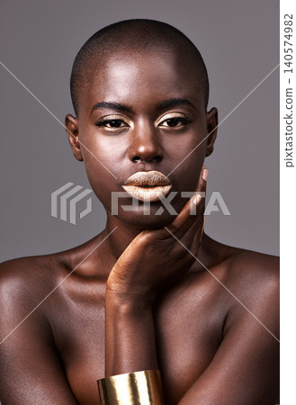Jewelry, portrait and face of black woman for makeup, beauty or cosmetics isolated on gray background. Person, African lady and eyeshadow with lipstick in studio for skin care, cleansing or treatment Jewelry, portrait and face of black woman for makeup, beauty or cosmetics isolated on gray background. Person, African lady and eyeshadow with lipstick in studio for skin care, cleansing or treatment 140574982