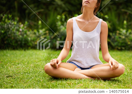 Meditation, yoga and woman on grass, lawn and garden outdoor for wellness, peace and to relax in nature. Female person, young lady and gen z girl in lotus position by trees, plants and environment Meditation, yoga and woman on grass, lawn and garden outdoor for wellness, peace and to relax in nature. Female person, young lady and gen z girl in lotus position by trees, plants and environment 140575014