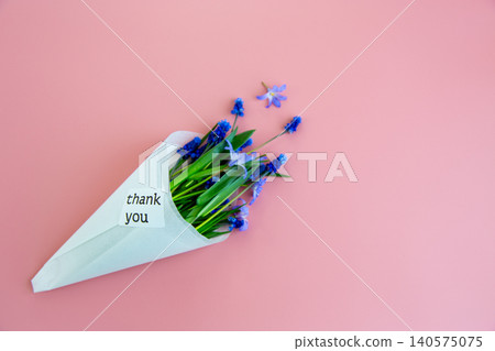 minimal spring composition with blue flowers and thank you text minimal spring composition with blue flowers and thank you text 140575075