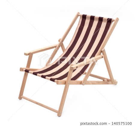 Wooden deck chair with striped fabric isolated on white background Wooden deck chair with striped fabric isolated on white background 140575100