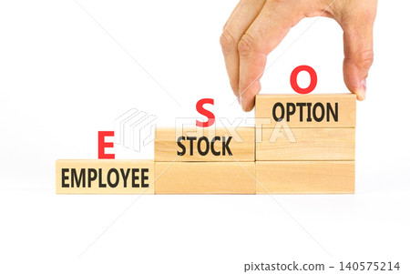 ESO employee stock option symbol. Concept words ESO employee stock option on beautiful wooden blocks. Beautiful white background. Business ESO employee stock option concept. Copy space. ESO employee stock option symbol. Concept words ESO employee stock option on beautiful wooden blocks. Beautiful white background. Business ESO employee stock option concept. Copy space. 140575214