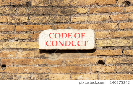 Code of conduct words symbol. Concept words Code of conduct on beautiful white sign plate. Beautiful brown brick wall background. Business Code of conduct concept. Copy space. Code of conduct words symbol. Concept words Code of conduct on beautiful white sign plate. Beautiful brown brick wall background. Business Code of conduct concept. Copy space. 140575242