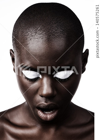 Black model, makeup and cosmetics with beauty, skin and creative with studio and color. Woman, closeup and face paint for artistic, contrast and aesthetic for glamour isolated on white background 140575261