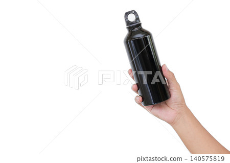 Hand holds sleek black water bottle. White background emphasizes product design. Simple, clean shot highlights portable hydration. Ideal for fitness, travel, or outdoor lifestyle themes Hand holds sleek black water bottle. White background emphasizes product design. Simple, clean shot highlights portable hydration. Ideal for fitness, travel, or outdoor lifestyle themes 140575819