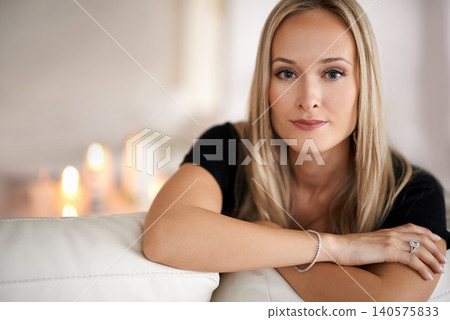 Portrait, serious woman and relax on couch, wellness and confidence of freelancer in living room. Face, pride and entrepreneur with candles in lounge, mindfulness and remote job with peace in house Portrait, serious woman and relax on couch, wellness and confidence of freelancer in living room. Face, pride and entrepreneur with candles in lounge, mindfulness and remote job with peace in house 140575833