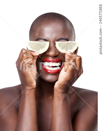 Woman, lipstick and lemon skincare in studio for organic dermatology routine, youth or wellness. White background, happy and African model with facial glow, fruit diet and eyes product for beauty Woman, lipstick and lemon skincare in studio for organic dermatology routine, youth or wellness. White background, happy and African model with facial glow, fruit diet and eyes product for beauty 140575868