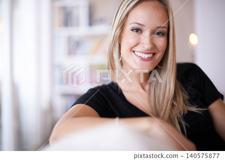 Portrait, woman and smile in living room or home for leisure, break and enjoy on couch. Female person, happy and satisfied with comfort or joy in lounge, sofa and positive for self care and wellbeing Portrait, woman and smile in living room or home for leisure, break and enjoy on couch. Female person, happy and satisfied with comfort or joy in lounge, sofa and positive for self care and wellbeing 140575877