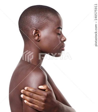 Profile of black woman, natural or skincare with beauty, cosmetics or healthy shine in studio. Side view, bald head or serious African girl model with wellness or glow results on white background Profile of black woman, natural or skincare with beauty, cosmetics or healthy shine in studio. Side view, bald head or serious African girl model with wellness or glow results on white background 140575911