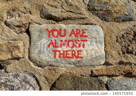 You are almost there symbol. Concept words You are almost there on beautiful grey stone. Beautiful stone wall background. Business You are almost there motivational support concept. Copy space You are almost there symbol. Concept words You are almost there on beautiful grey stone. Beautiful stone wall background. Business You are almost there motivational support concept. Copy space 140575950