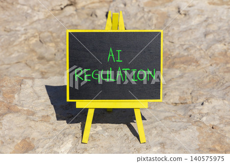 AI regulation symbol. Concept words AI artificial intelligence regulation on beautiful black blackboard. Beautiful stone background. Business AI artificial intelligence regulation concept. Copy space. AI regulation symbol. Concept words AI artificial intelligence regulation on beautiful black blackboard. Beautiful stone background. Business AI artificial intelligence regulation concept. Copy space. 140575975