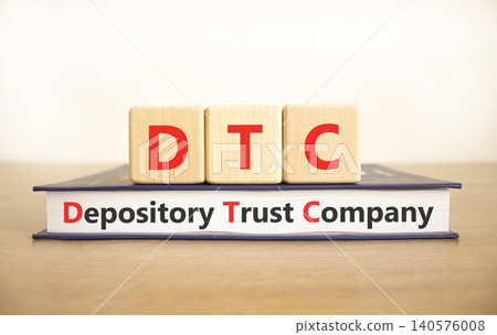 DTC depository trust company symbol. Concept words DTC depository trust company on beautiful wooden blocks. Beautiful white background. Business DTC depository trust company concept. Copy space. 140576008