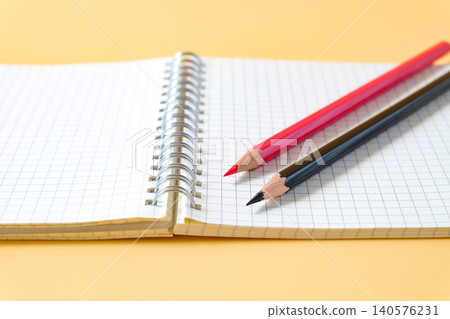 Pencil on spiral-bound book note ,education concept. Pencil on spiral-bound book note ,education concept. 140576231
