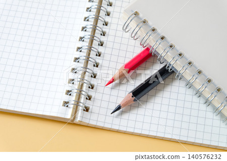 Pencil on spiral-bound book note ,education concept. Pencil on spiral-bound book note ,education concept. 140576232