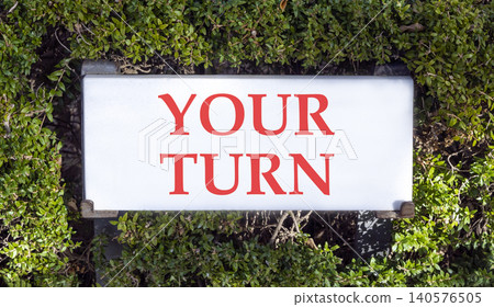 Your turn words symbol. Concept words Your turn on beautiful white sign plate. Beautiful green trees background. Business your turn motivational support concept. Copy space. 140576505
