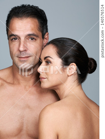 Couple, hug and skincare in studio, beauty and collagen cosmetics for anti aging. Mature people, facial treatment and dermatology for health on gray background, embrace and together for wellness Couple, hug and skincare in studio, beauty and collagen cosmetics for anti aging. Mature people, facial treatment and dermatology for health on gray background, embrace and together for wellness 140576514