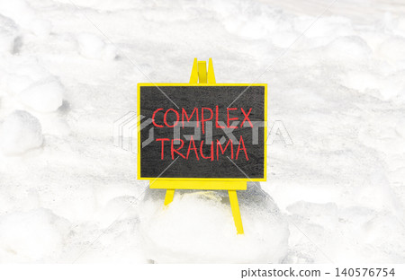 Complex trauma words symbol. Concept words Complex trauma on beautiful black blackboard. Beautiful white snow background. Psychological complex trauma support concept. Copy space. Complex trauma words symbol. Concept words Complex trauma on beautiful black blackboard. Beautiful white snow background. Psychological complex trauma support concept. Copy space. 140576754