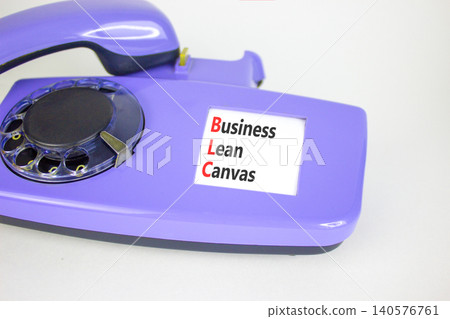 BLC business lean canvas symbol. Concept words BLC business lean canvas on beautiful old disk phone. Beautiful white background. BLC business lean canvas concept. Copy space. BLC business lean canvas symbol. Concept words BLC business lean canvas on beautiful old disk phone. Beautiful white background. BLC business lean canvas concept. Copy space. 140576761