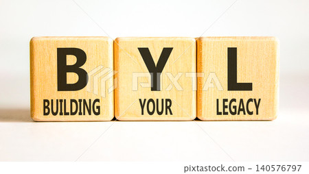 BYL building your legacy symbol. Concept words BYL building your legacy on beautiful wooden blocks. Beautiful white background. Business BYL building your legacy concept. Copy space. 140576797