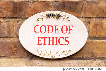 Code of ethics words symbol. Concept words Code of ethics on beautiful white sign plate. Beautiful brown brick wall background. Business Code of ethics concept. Copy space. Code of ethics words symbol. Concept words Code of ethics on beautiful white sign plate. Beautiful brown brick wall background. Business Code of ethics concept. Copy space. 140576823