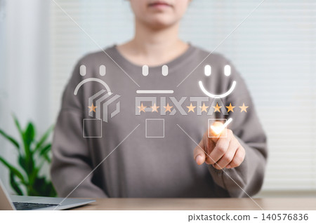 Customer satisfaction feedback and rating concept. Woman selecting five-star happy face rating on survey interface, representing customer satisfaction, feedback, review process. user experience, Customer satisfaction feedback and rating concept. Woman selecting five-star happy face rating on survey interface, representing customer satisfaction, feedback, review process. user experience, 140576836