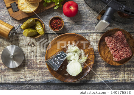 Step 3. Cooking homemade cheeseburger in kitchen gadget modern air fryer. Lifestyle trendy of new cooking. Step 3. Cooking homemade cheeseburger in kitchen gadget modern air fryer. Lifestyle trendy of new cooking. 140576858