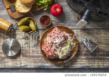 Step 4. Cooking homemade cheeseburger in kitchen gadget modern air fryer. Lifestyle trendy of new cooking. Step 4. Cooking homemade cheeseburger in kitchen gadget modern air fryer. Lifestyle trendy of new cooking. 140576859