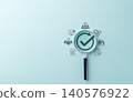 Quality Assurance and Certification Compliance Concept. A magnifying glass with checkmark surrounded by business icon, symbolizing quality assurance, compliance, and certification. certified document, 140576922