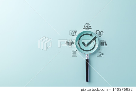 Quality Assurance and Certification Compliance Concept. A magnifying glass with checkmark surrounded by business icon, symbolizing quality assurance, compliance, and certification. certified document, 140576922