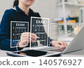 Online exam and digital assessment concept. Woman taking digital multiple-choice exam on laptop with transparent answer sheets, representing online education and testing. quiz, survey, questionnaire, 140576927