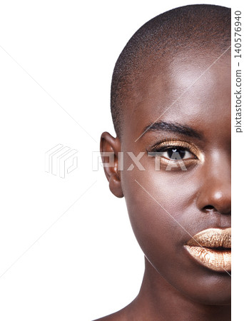 Portrait, half and black woman with lipstick, makeup and dermatology on a white studio background. African person, face and model with wellness and beauty with aesthetic, skincare or shine with glow Portrait, half and black woman with lipstick, makeup and dermatology on a white studio background. African person, face and model with wellness and beauty with aesthetic, skincare or shine with glow 140576940