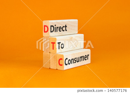 DTC direct to consumer symbol. Concept words DTC direct to consumer on beautiful wooden blocks. Beautiful orange background. Business DTC direct to consumer concept. Copy space. DTC direct to consumer symbol. Concept words DTC direct to consumer on beautiful wooden blocks. Beautiful orange background. Business DTC direct to consumer concept. Copy space. 140577176