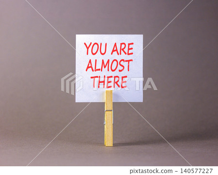 You are almost there words symbol. Concept words You are almost there on beautiful white paper. Beautiful grey background. Business You are almost there motivational support concept. Copy space. You are almost there words symbol. Concept words You are almost there on beautiful white paper. Beautiful grey background. Business You are almost there motivational support concept. Copy space. 140577227