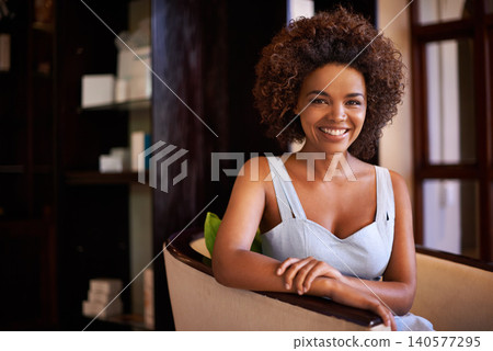 Woman, smile and portrait for relax and happy in home or indoor on weekend and alone on break and joyful. African person and attractive for peace, rest or chill in living room or house on mockup 140577295