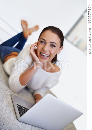 Laptop, funny and woman on floor in home for remote work, social media or laughing at meme on internet in Australia. Computer, freelancer and happy face of person on carpet with technology to relax 140577304