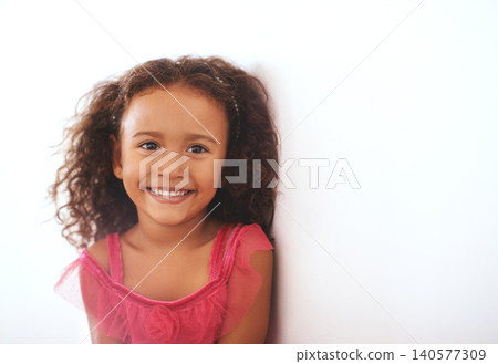 Girl, kid and portrait or smile in home with confidence, wellness and trendy outfit for fashion aesthetic. Child, face and happy with relax by wall in living room with mockup, good mood or curly hair Girl, kid and portrait or smile in home with confidence, wellness and trendy outfit for fashion aesthetic. Child, face and happy with relax by wall in living room with mockup, good mood or curly hair 140577309