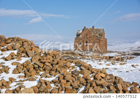 The ancient Cathedral of Ani with water reflection and winter snow in Kars, Turkey The ancient Cathedral of Ani with water reflection and winter snow in Kars, Turkey 140577312