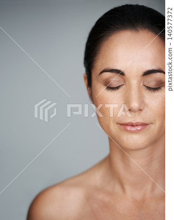 Skincare, cosmetics and beauty for woman in studio for dermatology, wellness and clean for hygiene on mockup. Mature person and model with glow and gloss for makeup and cleanse for care and facial Skincare, cosmetics and beauty for woman in studio for dermatology, wellness and clean for hygiene on mockup. Mature person and model with glow and gloss for makeup and cleanse for care and facial 140577372