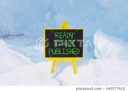 Ready to get published words symbol. Concept words Ready to get published on beautiful black blackboard. Beautiful blue ice background. Business ready to get published motivational concept. Copy space 140577428