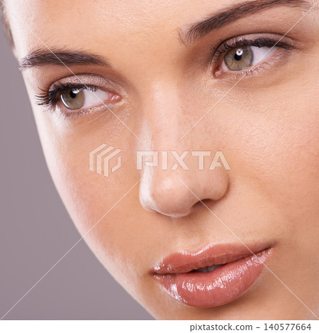 Closeup, woman and makeup for thinking, beauty and planning of facial, health and skincare in studio. Female person, glow and idea of cosmetology, flawless skin and dermatology as vision of self care Closeup, woman and makeup for thinking, beauty and planning of facial, health and skincare in studio. Female person, glow and idea of cosmetology, flawless skin and dermatology as vision of self care 140577664