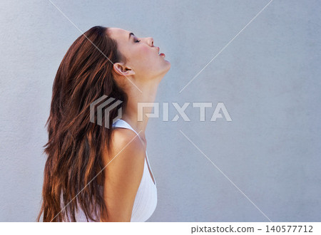 Profile, studio and woman with relax hair for salon or keratin treatment, growth and volume for styling. Female person, hairstyle and natural cosmetics with mockup space for hair care and wellness Profile, studio and woman with relax hair for salon or keratin treatment, growth and volume for styling. Female person, hairstyle and natural cosmetics with mockup space for hair care and wellness 140577712
