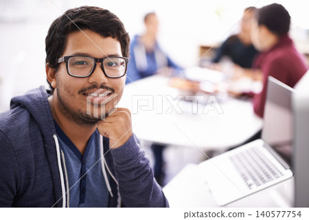 University, glasses and portrait of man with laptop for research, study or opportunity for education. Computer, knowledge and face of happy college student with online course, pride and confidence. University, glasses and portrait of man with laptop for research, study or opportunity for education. Computer, knowledge and face of happy college student with online course, pride and confidence. 140577754