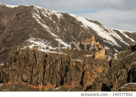Ancient Devils Castle built on steep rocks in a canyon valley, Ardahan, Turkey Ancient Devils Castle built on steep rocks in a canyon valley, Ardahan, Turkey 140577882