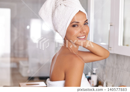 Woman, towel and fresh in bathroom, smile and shower for hygiene in apartment. Wash, clean or grooming skincare portrait for wellness or self care, health and glowing face routine for female person Woman, towel and fresh in bathroom, smile and shower for hygiene in apartment. Wash, clean or grooming skincare portrait for wellness or self care, health and glowing face routine for female person 140577883