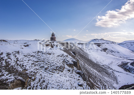 Ancient Armenian church ruins in Ani archaeological site covered in snow, Kars, Turkey 140577889